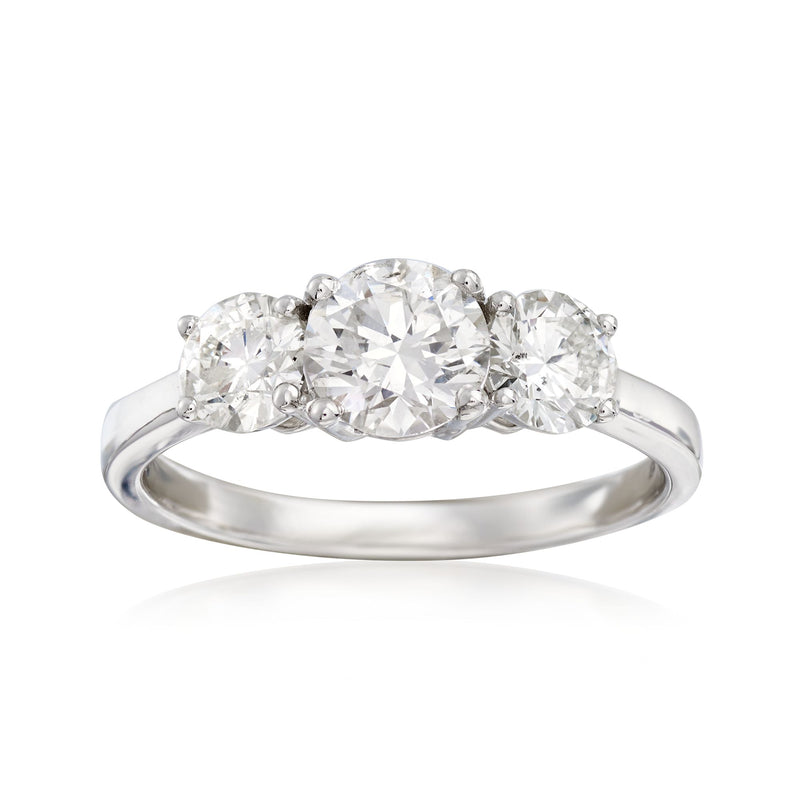14kt white gold three-stone diamond ring with three round-cut stones