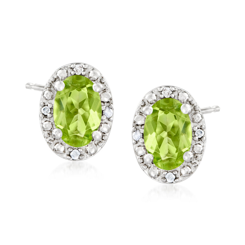Sterling silver oval peridot stud earrings with diamond accents, post backs