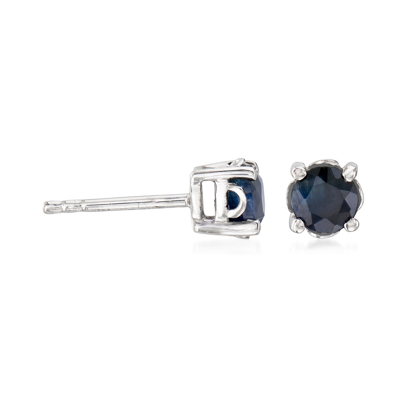 Sterling silver round sapphire stud earrings, side view with four-prong setting, dark blue