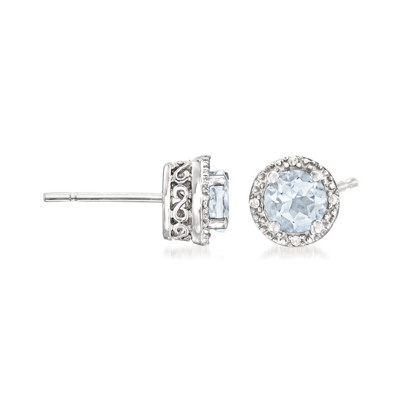Sterling silver post stud earrings with round aquamarine and diamond halo detail