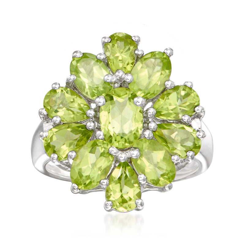 Sterling silver peridot cluster ring with oval green gemstones and small round accents