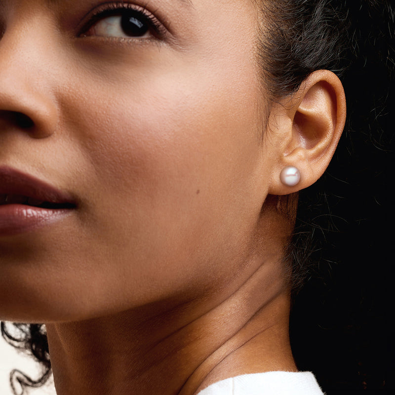 Sterling silver pearl stud earrings with round white cultured pearls