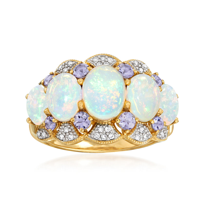 14kt yellow gold ring with opal-like oval stones, purple accents, and diamond halo