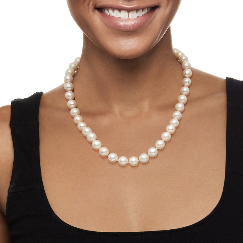 Cultured pearl necklace with sterling silver, single strand of round white pearls on neck