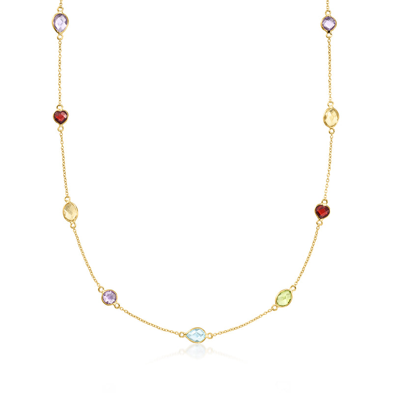 Multi-gemstone station necklace with round and oval colorful stones on gold chain