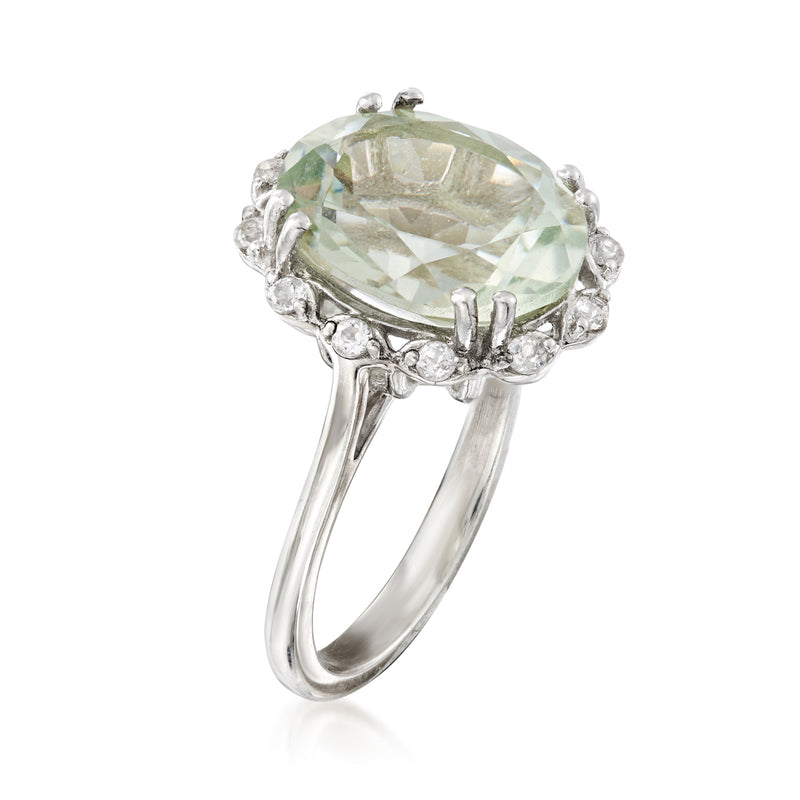 Sterling silver oval prasiolite ring with side prongs and white stone halo