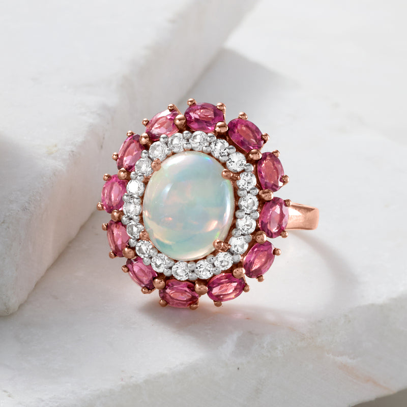 Opal ring with pink tourmaline and white topaz in rose gold