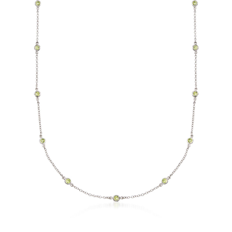 Sterling silver station necklace with round green peridot gemstones, link stations