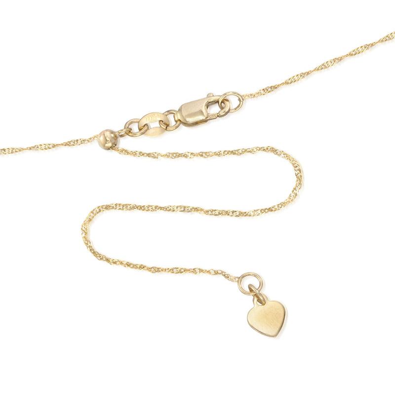 Yellow gold adjustable chain with lobster clasp and small heart charm