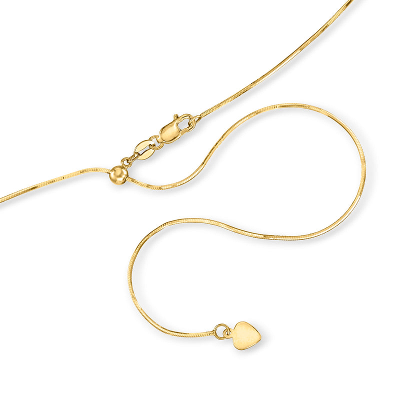 14kt yellow gold snake-chain necklace with clasp and small heart-shaped charm