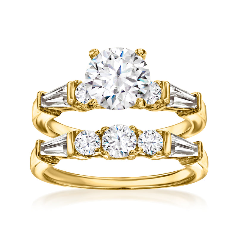 CZ bridal set with large round center stone, three-stone wedding band in yellow gold-tone