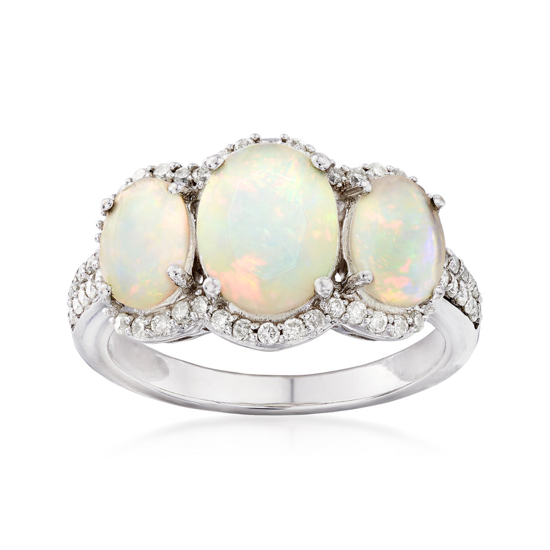 14kt white gold opal and diamond oval ring with three opal-like stones