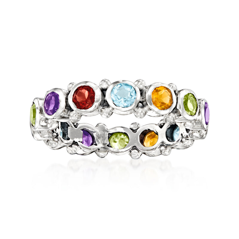 Sterling silver eternity band with multicolored gemstones in round settings
