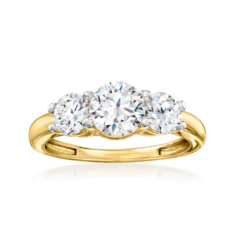14kt yellow gold ring with three round CZ stones, center larger, shared prong setting