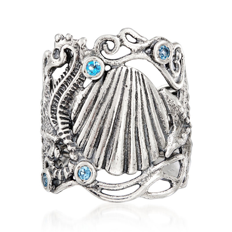 Sterling silver sea life ring with scallop shell and three blue topaz stones