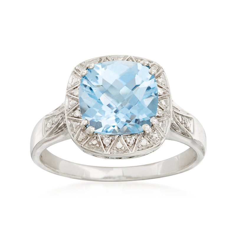 Sterling silver ring with cushion-cut light blue topaz and diamond accents
