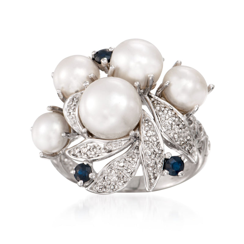 Sterling silver ring with large cultured pearls and blue sapphire accents, diamond detailing