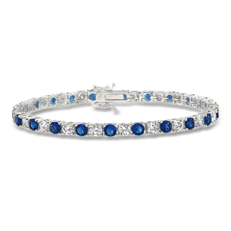 Sterling silver tennis bracelet with blue simulated sapphire stones and clear CZ accents