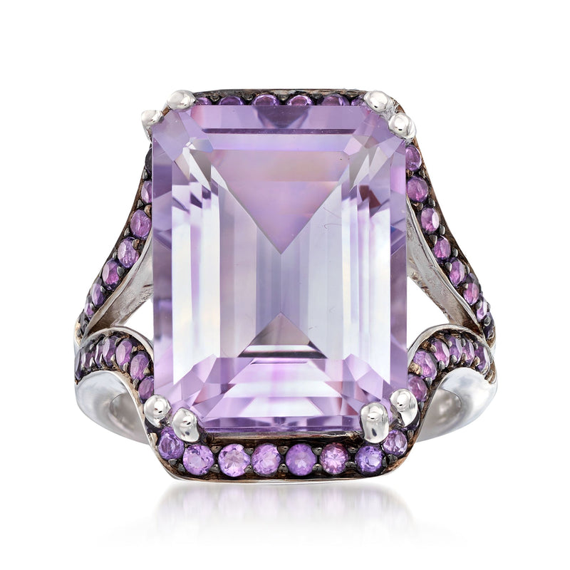 Sterling silver ring with large rectangular amethyst center and purple side stones