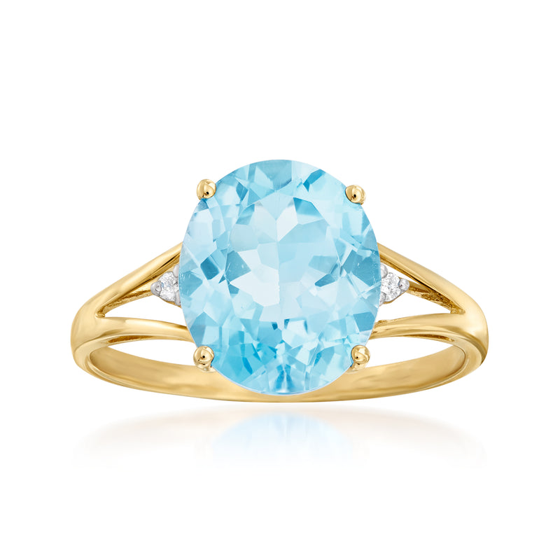 14kt yellow gold ring with oval Swiss blue topaz and small diamond accents