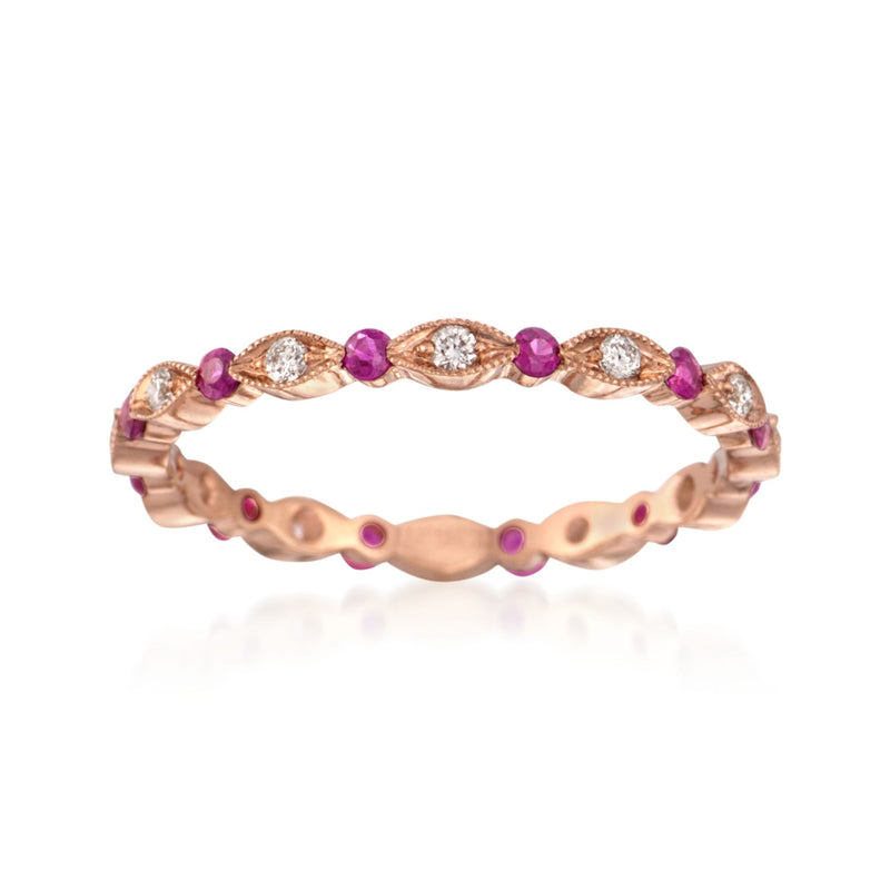 18k rose gold eternity band with alternating purple rubies and small diamonds