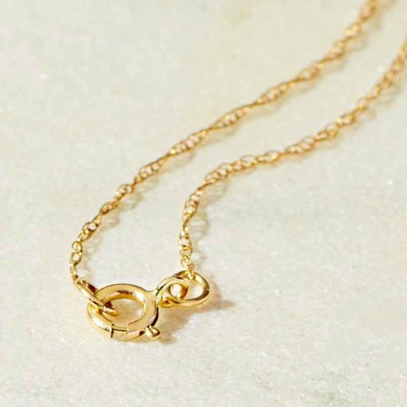 Yellow gold love-knot pendant necklace with fine chain, detailed knot loops