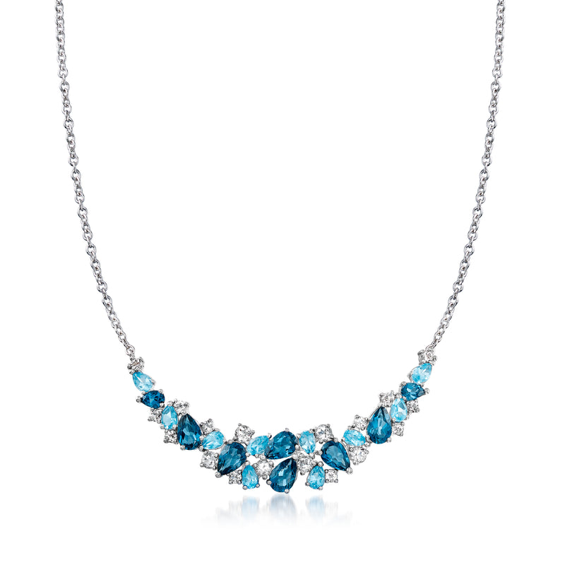 Sterling silver collar necklace with blue and clear topaz marquise stones, chain link