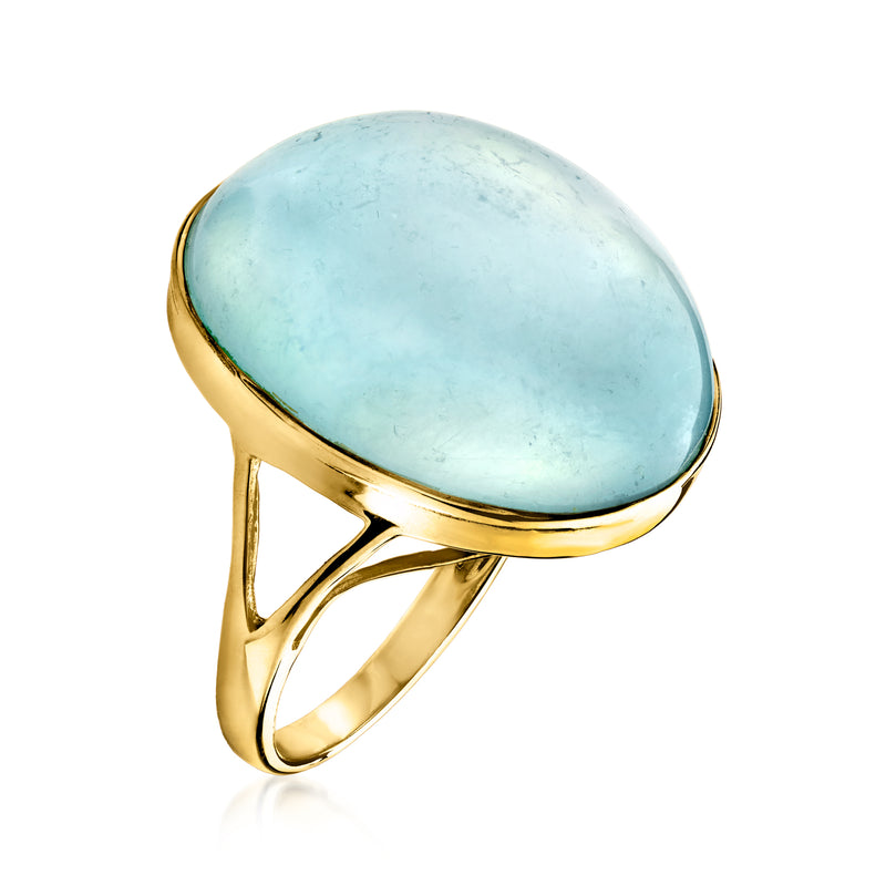 Oval aquamarine cabochon ring in 14kt yellow gold with open split gallery