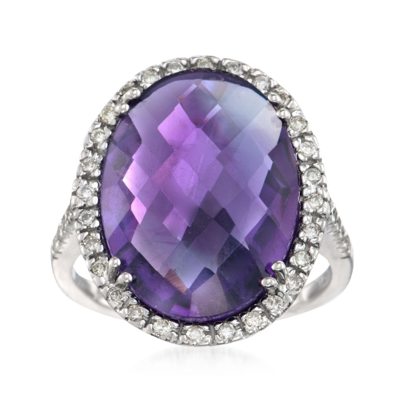 14kt white gold ring with large oval amethyst center and diamond halo