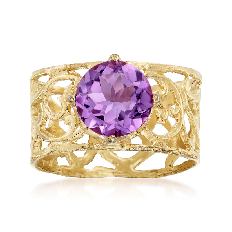Amethyst gemstone ring with gold-toned filigree band, oval faceted center