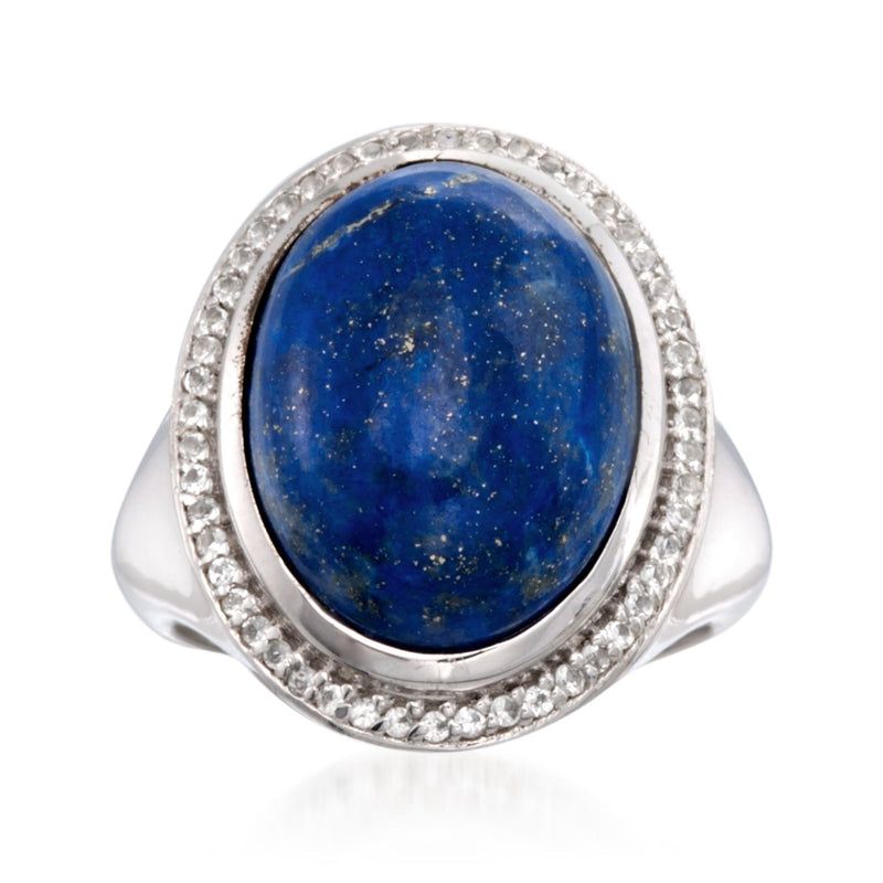Sterling silver ring with oval lapis lazuli cabochon and white stone halo