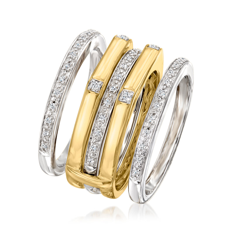Four stackable diamond rings in sterling silver and gold over sterling, with baguette accents
