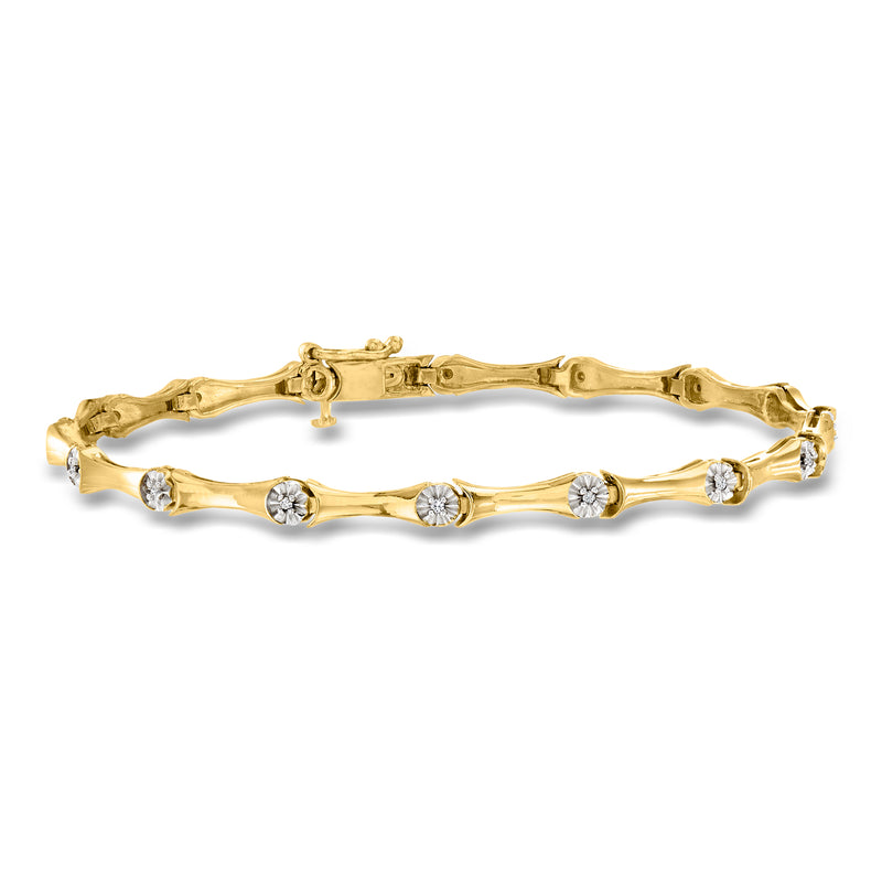 Gold over sterling diamond station bracelet with small round stones and clasp