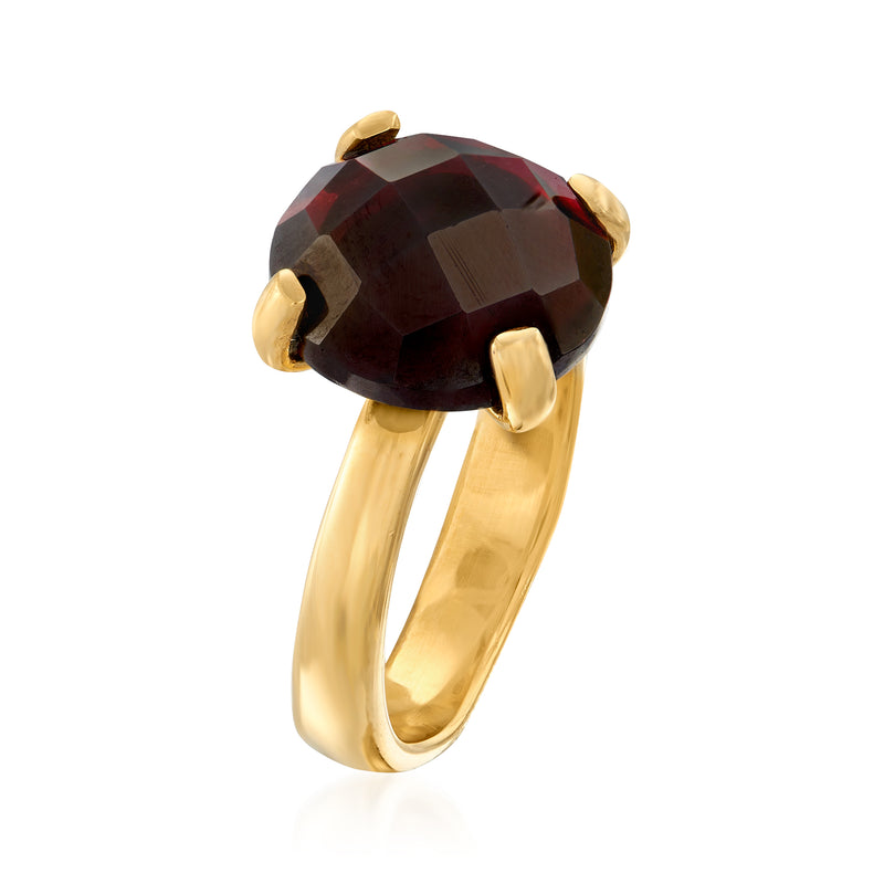 Gold over sterling ring with oval cushion dark red garnet and four corner prongs
