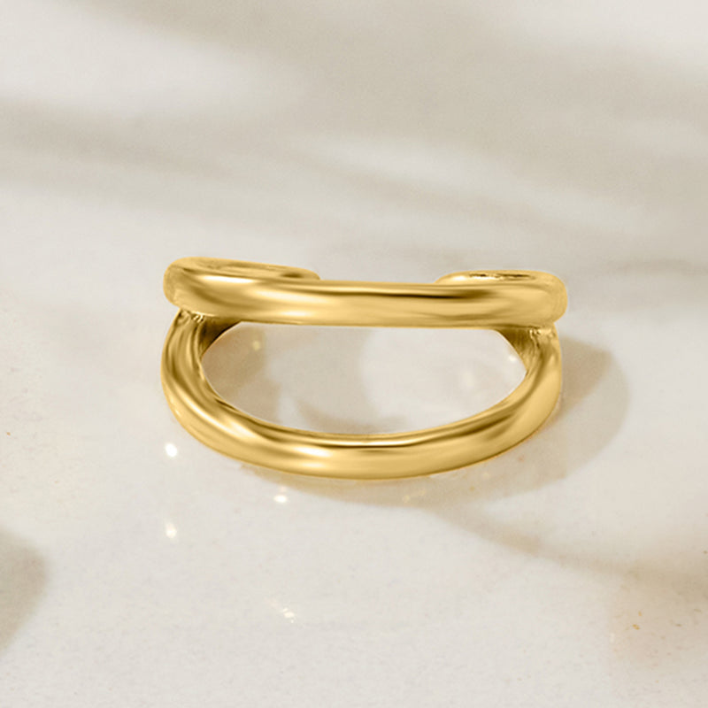 14kt yellow gold ear cuff, open oval design with diamond accent