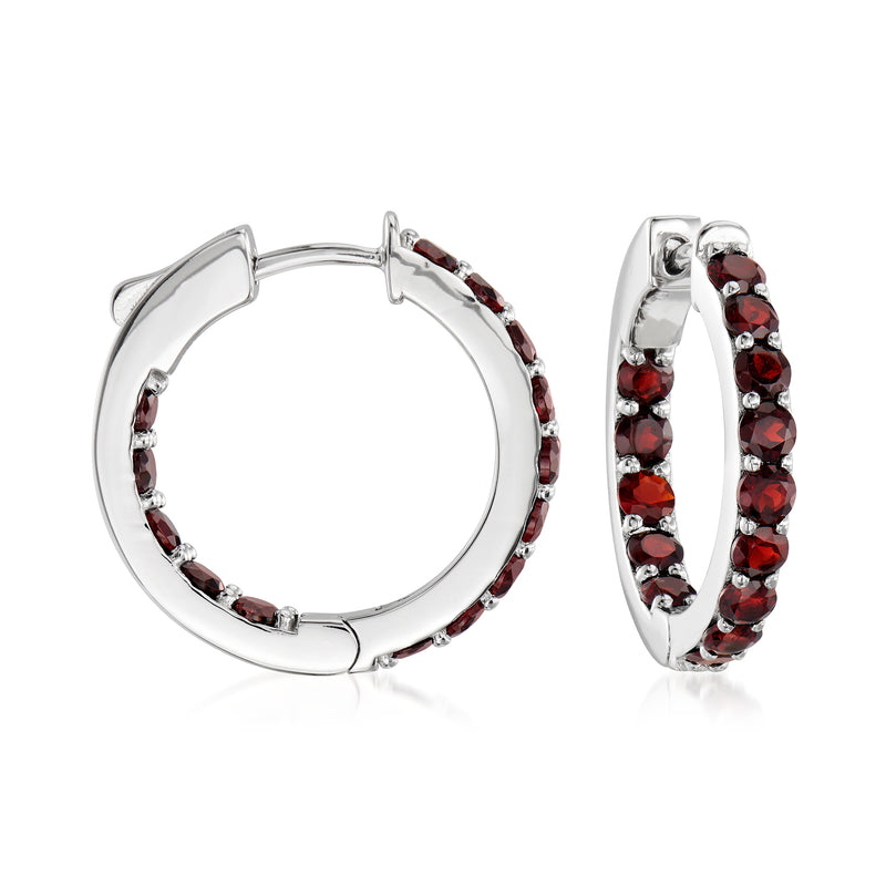 Sterling silver hoop earrings with round red garnet stones, inside-out surround