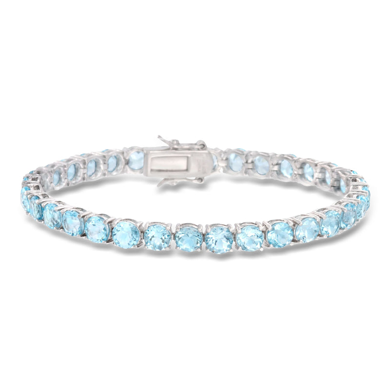 Sky blue topaz tennis bracelet in sterling silver, oval stones with box clasp