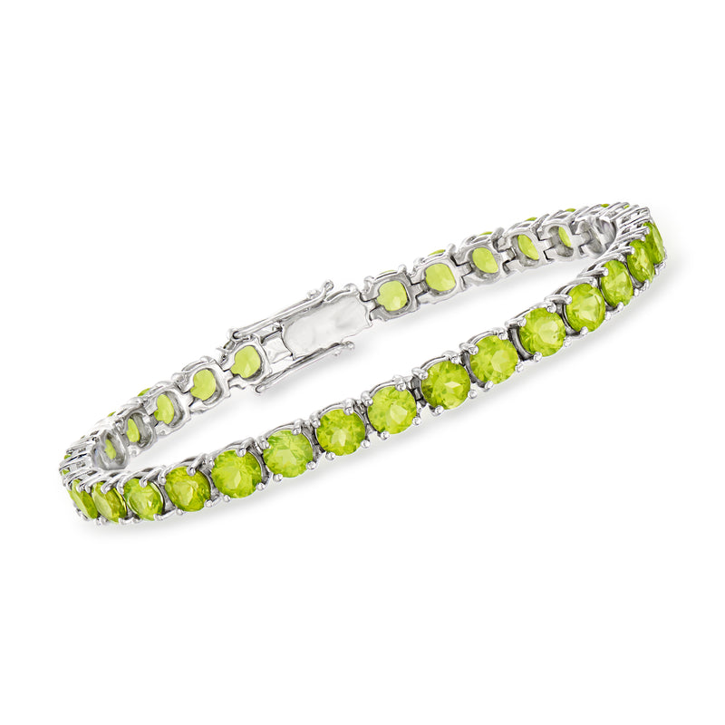 Sterling silver tennis bracelet with prong-set oval peridot gemstones, double row style