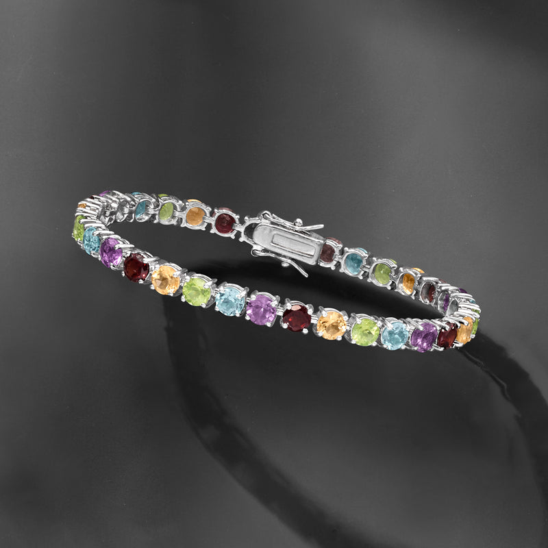 Multi-gemstone tennis bracelet in sterling silver with hinged clasp and colorful stones