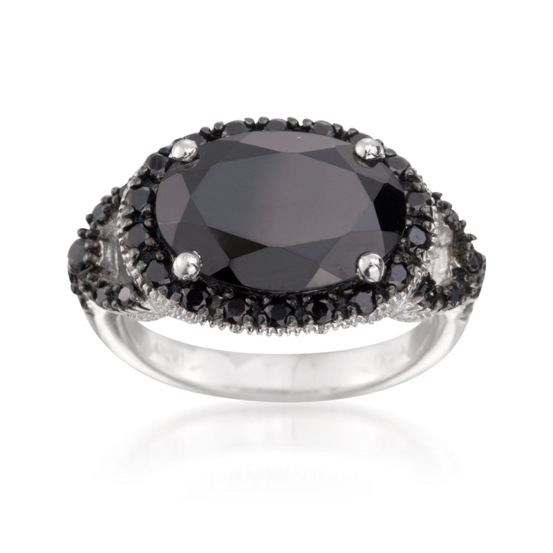 Black spinel cocktail ring in sterling silver with oval faceted center stone