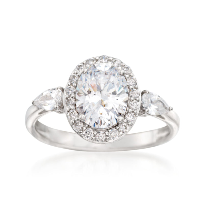 Sterling silver oval CZ ring with halo setting and teardrop side stones
