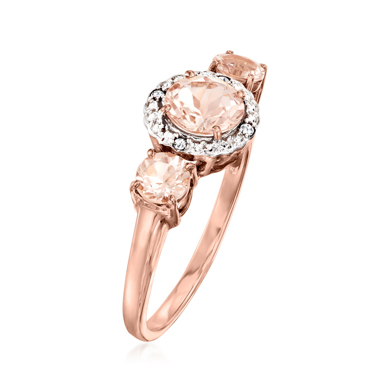 Angled view of two-tone gold morganite ring with diamond halo and side stones