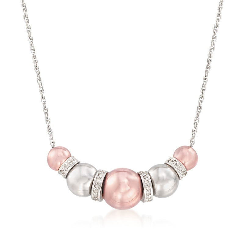 Two-tone diamond spacer necklace with pink and silver bead stations, round pink center.