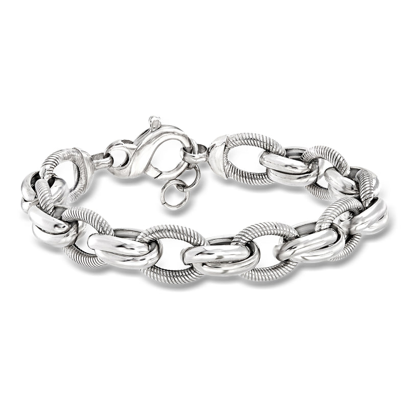 Sterling silver multi-link bracelet with textured and polished links, lobster clasp