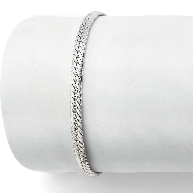 White gold Cuban-link bracelet with hinged clasp, close-up side view