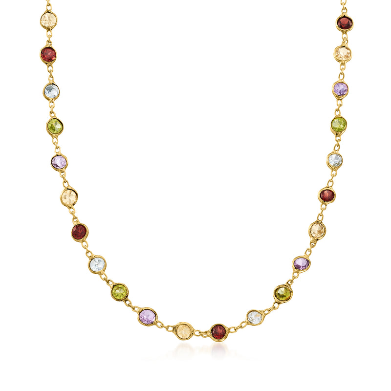 Gold-tone bezel-set multi-gemstone necklace with round red, purple, green, and clear stones