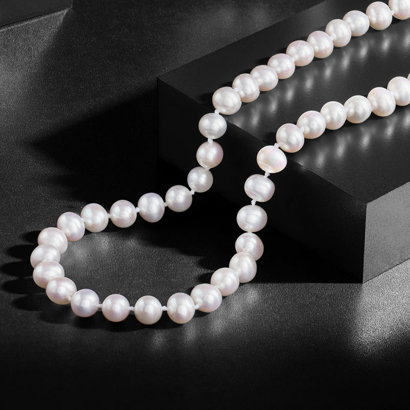 Cultured pearl necklace with round pearls, double-loop drape