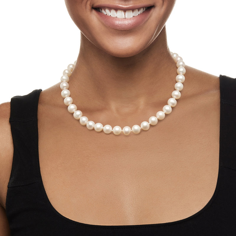 Cultured pearl necklace with graduated round white beads and yellow gold accents