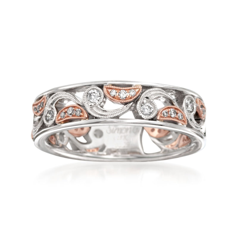 Two-tone gold diamond paisley band ring with round and teardrop accents