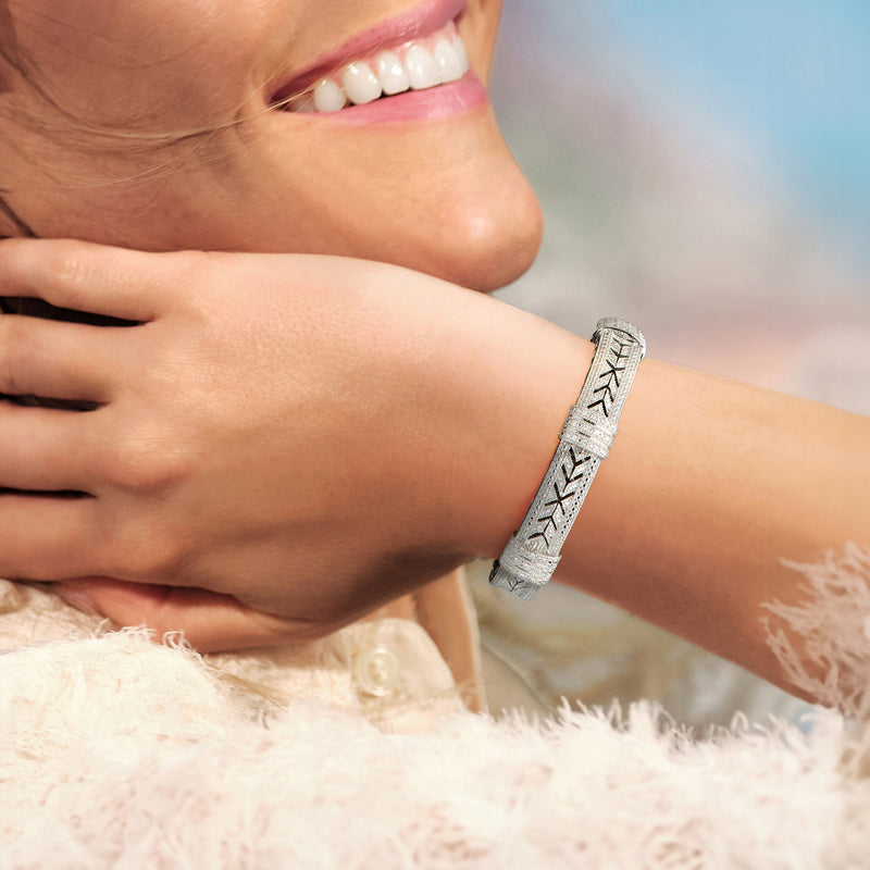 Sterling silver vintage-style diamond cuff bracelet on wrist